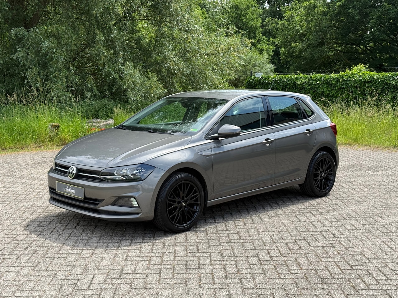 Volkswagen Polo - 1.0 TSI Comfortline CARPLAY I PDC I CLIMA I WEINIG KM I 95PK! - AutoWereld.nl