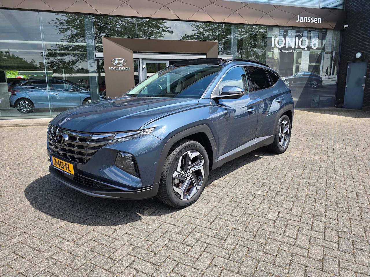 Hyundai Tucson - 1.6 T-GDI PHEV Premium Sky 4WD trekhaak/1e eig. - AutoWereld.nl