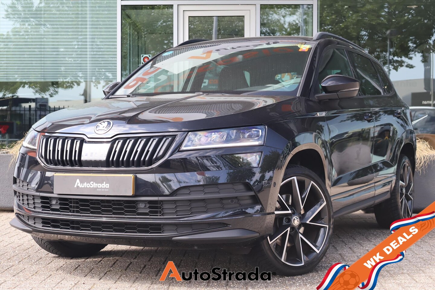 Skoda Karoq - 1.5 SportLine TSI ACT 150pk | Trekhaak | Stoelverwarming | Virtual | Camera | Keyless | Sf - AutoWereld.nl