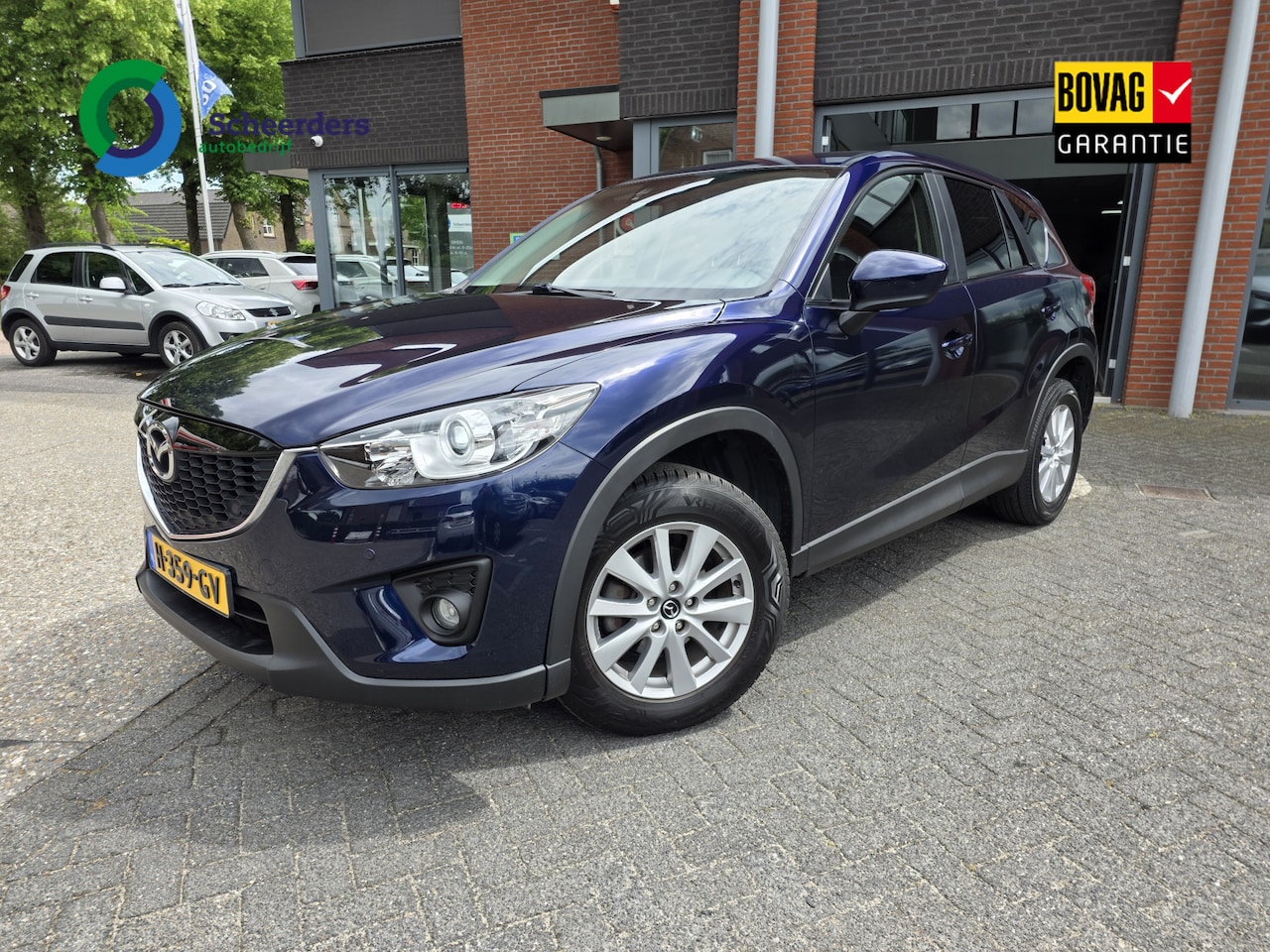 Mazda CX-5 - 2.0 TS 4WD 2.0 TS+ 4WD,Navi,trekhaak,1 jaar garantie - AutoWereld.nl