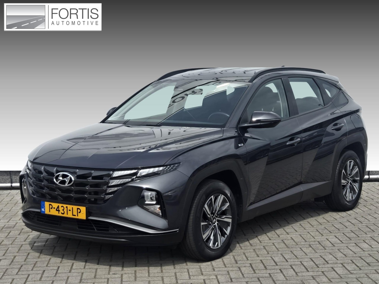 Hyundai Tucson - 1.6 T-GDI MHEV i-Motion NL-AUTO | TREKHAAK | NAVI - AutoWereld.nl