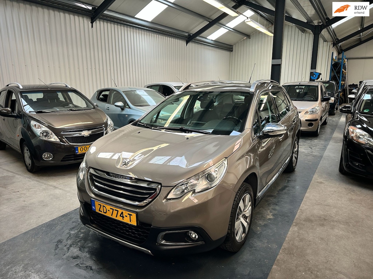 Peugeot 2008 - 1.2 VTi Allure Pack Premium Plus 1.2 VTi Allure Pack Premium Plus - AutoWereld.nl