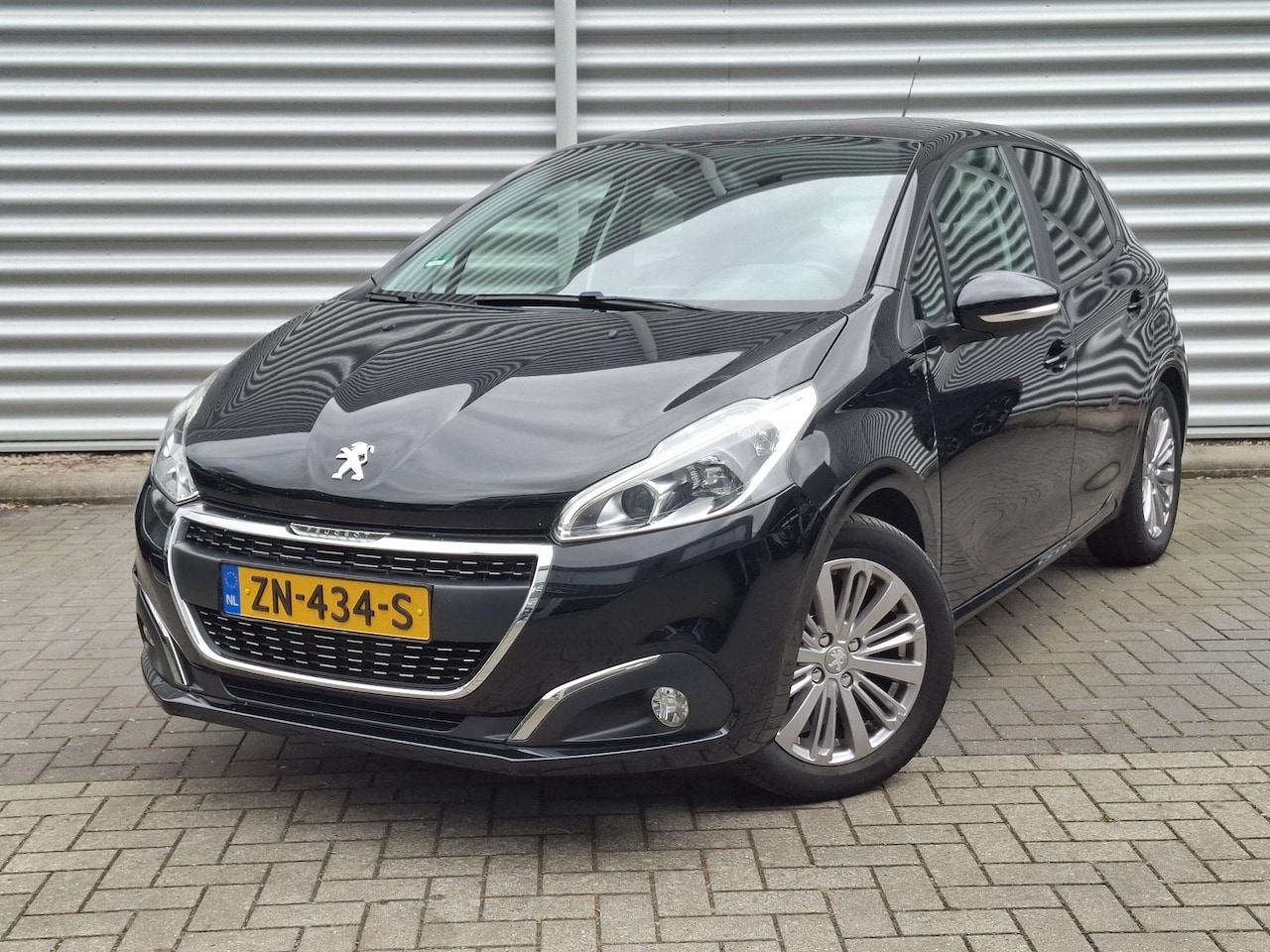Peugeot 208 - 1.2 Signature Nav/Airco/LMV/Park - AutoWereld.nl