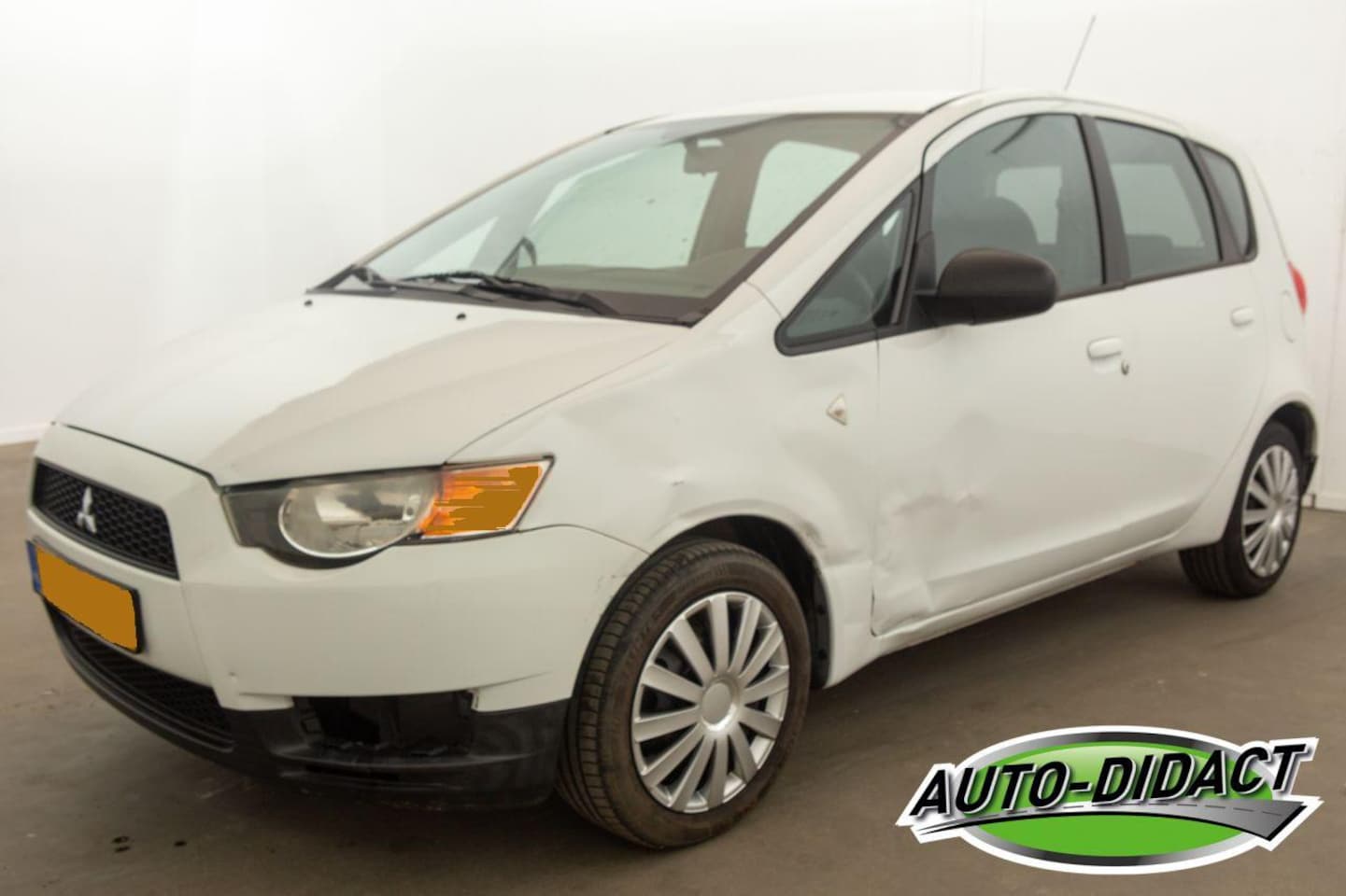 Mitsubishi Colt - 1.1 Edition One Airco - AutoWereld.nl