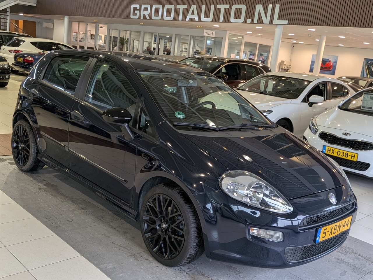 Fiat Punto Evo - 0.9 TwinAir Street Airco, Cruise Control, Stuurbekrachtiging - AutoWereld.nl