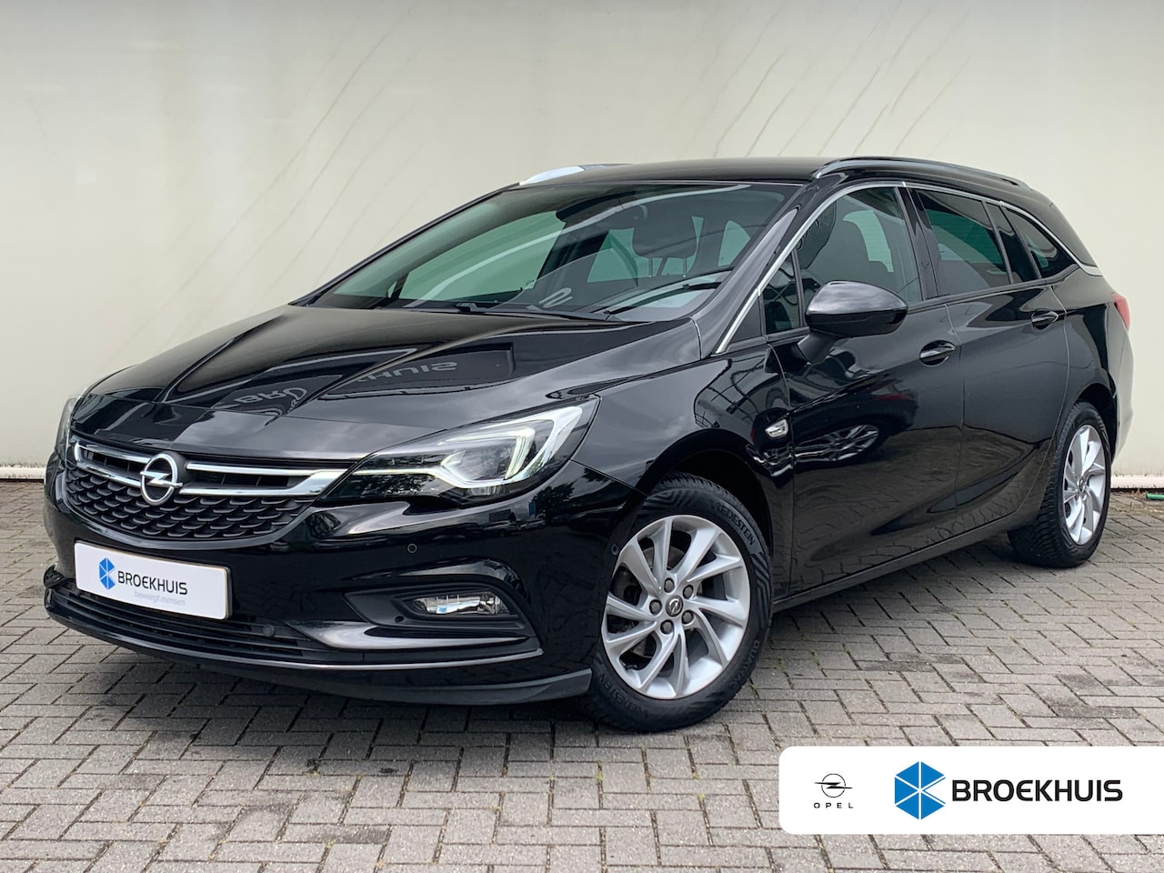 Opel Astra Sports Tourer - 1.4 Innovation Airco | Camera | Cruise Control | DAB | Elektrische Achterklep | Keyless | - AutoWereld.nl