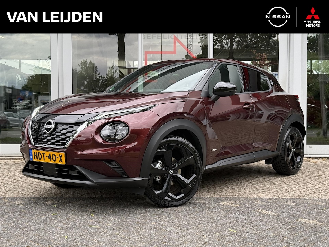 Nissan Juke - Hybrid 143pk Tekna | Leder | BOSE | Navigatie | App Connect | All Season | Keyless - AutoWereld.nl