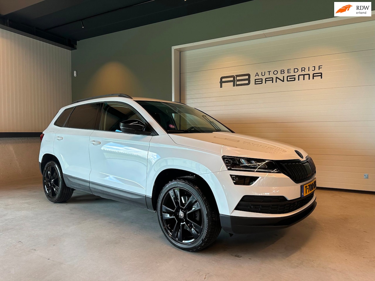 Skoda Karoq - 1.0 TSI AUTOMAAT STYLE BUSINESS-uit|NAVIGATIE|CLIMA AIRCO|CRUISECONTROL|APPLE CARPLAY+ANDR - AutoWereld.nl