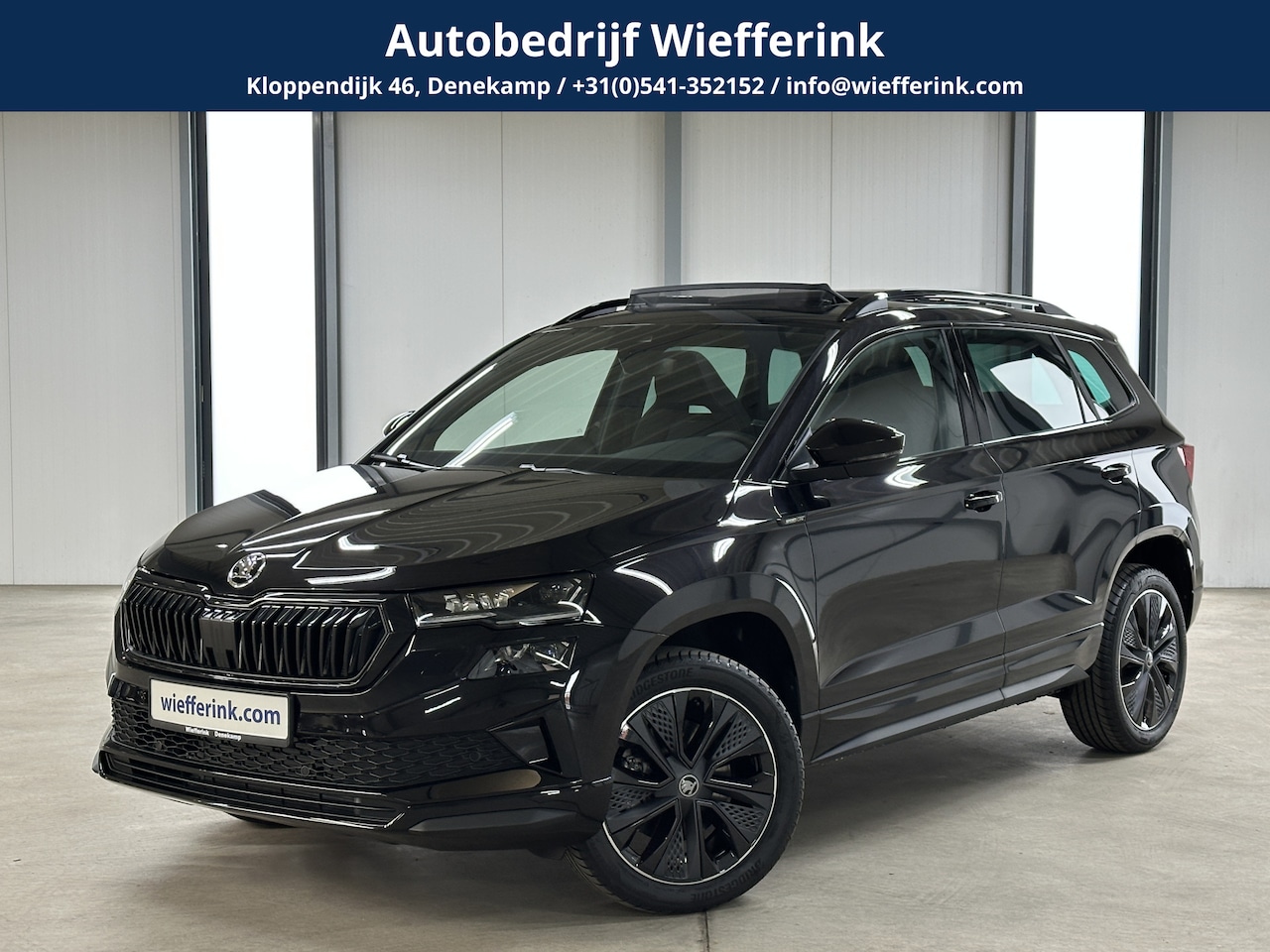 Skoda Karoq - 1.5 TSI 150pk ACT Sportline Business | Elek. Trekhaak | Elk. panodak | Navi - AutoWereld.nl