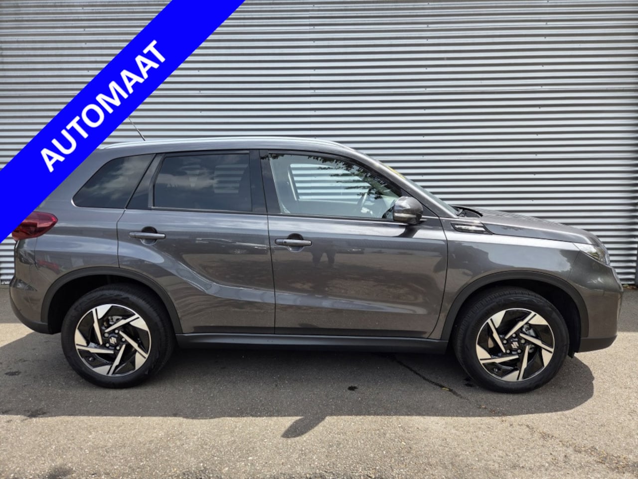 Suzuki Vitara - 1.5 Hybrid Style Automaat Panoramadak - AutoWereld.nl