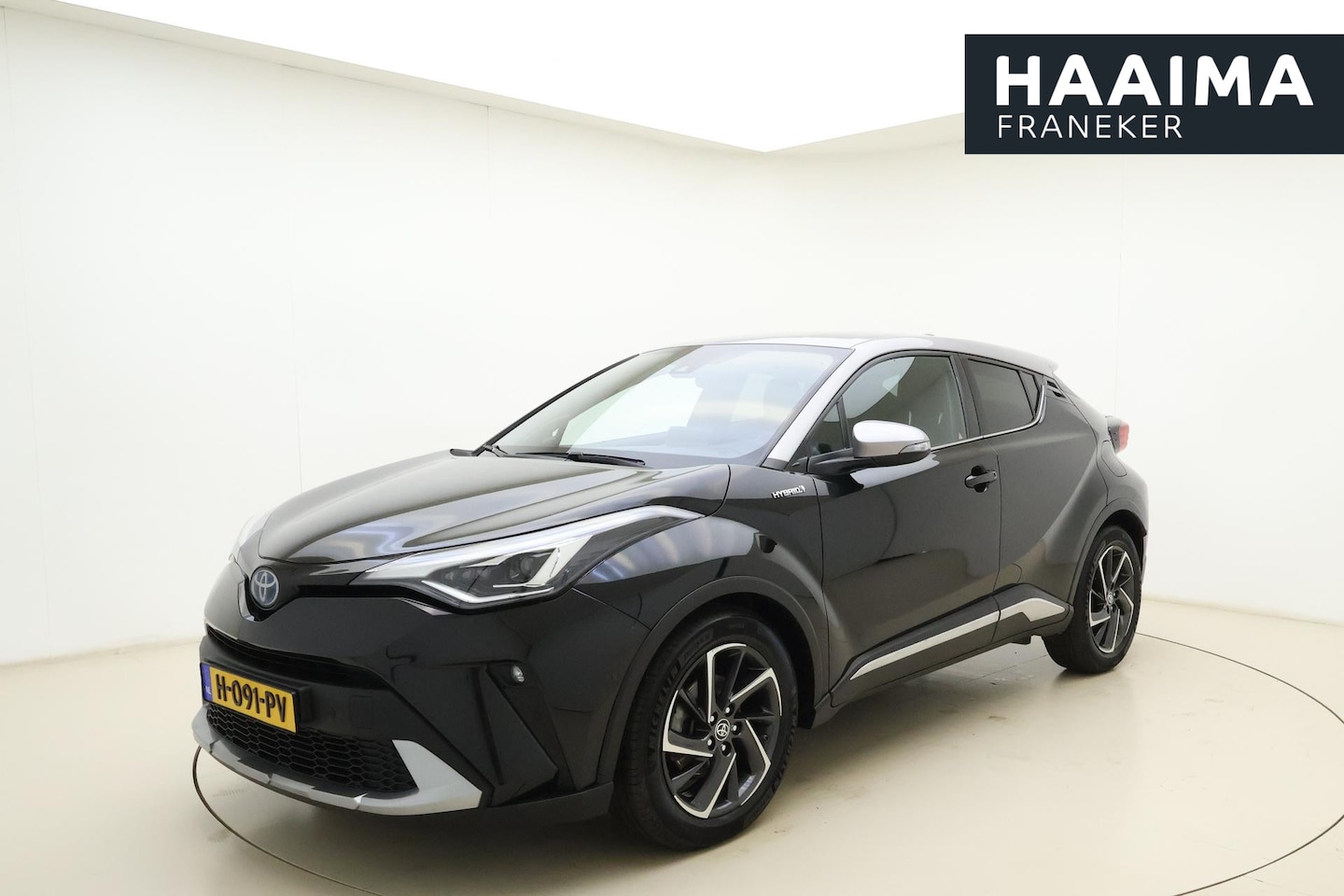 Toyota C-HR - 2.0 Hybrid Bi-Tone 184pk | Navigatie | JBL | Camera | Stoelverwarming | Cruise Control | L - AutoWereld.nl