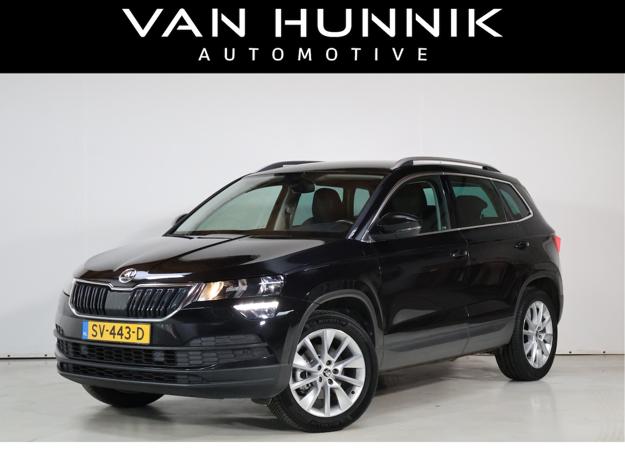 Skoda Karoq - 1.5 TSI ACT Ambition Business | Leder | Trekhaak | Cruise | Camera - AutoWereld.nl