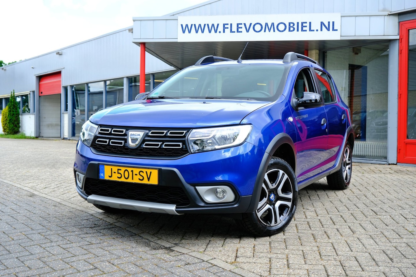 Dacia Sandero - 0.9 TCe Tech Road Aut. Navi|1e Eigenaar!|Cam|Clima - AutoWereld.nl
