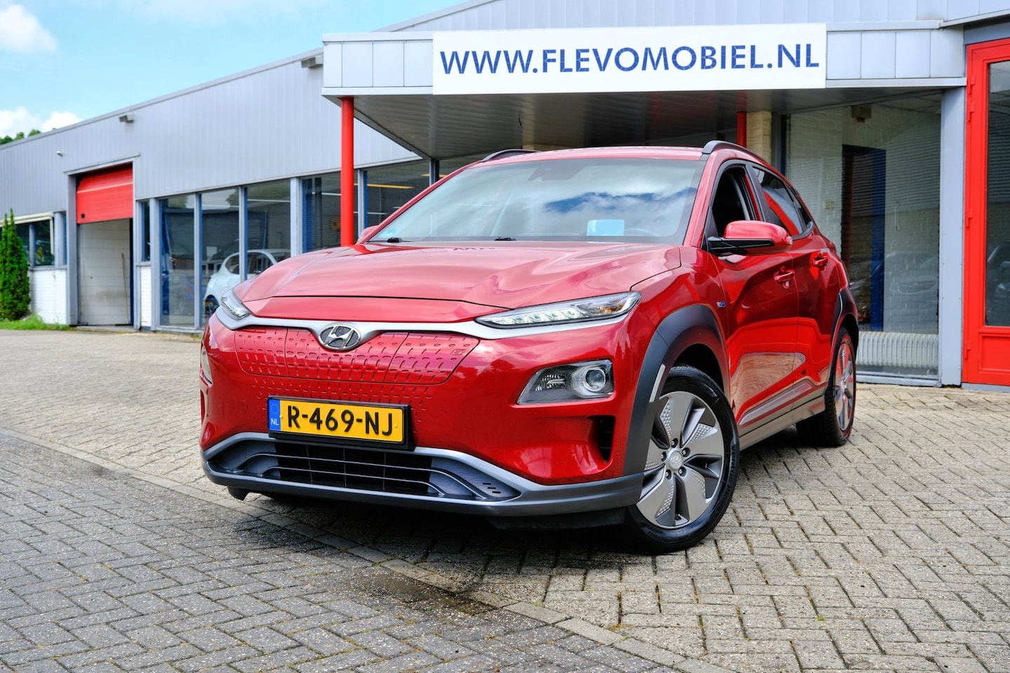 Hyundai Kona Electric - EV Comfort 64 kWh Aut. Half Leder|Navi|Cam|HUD - AutoWereld.nl