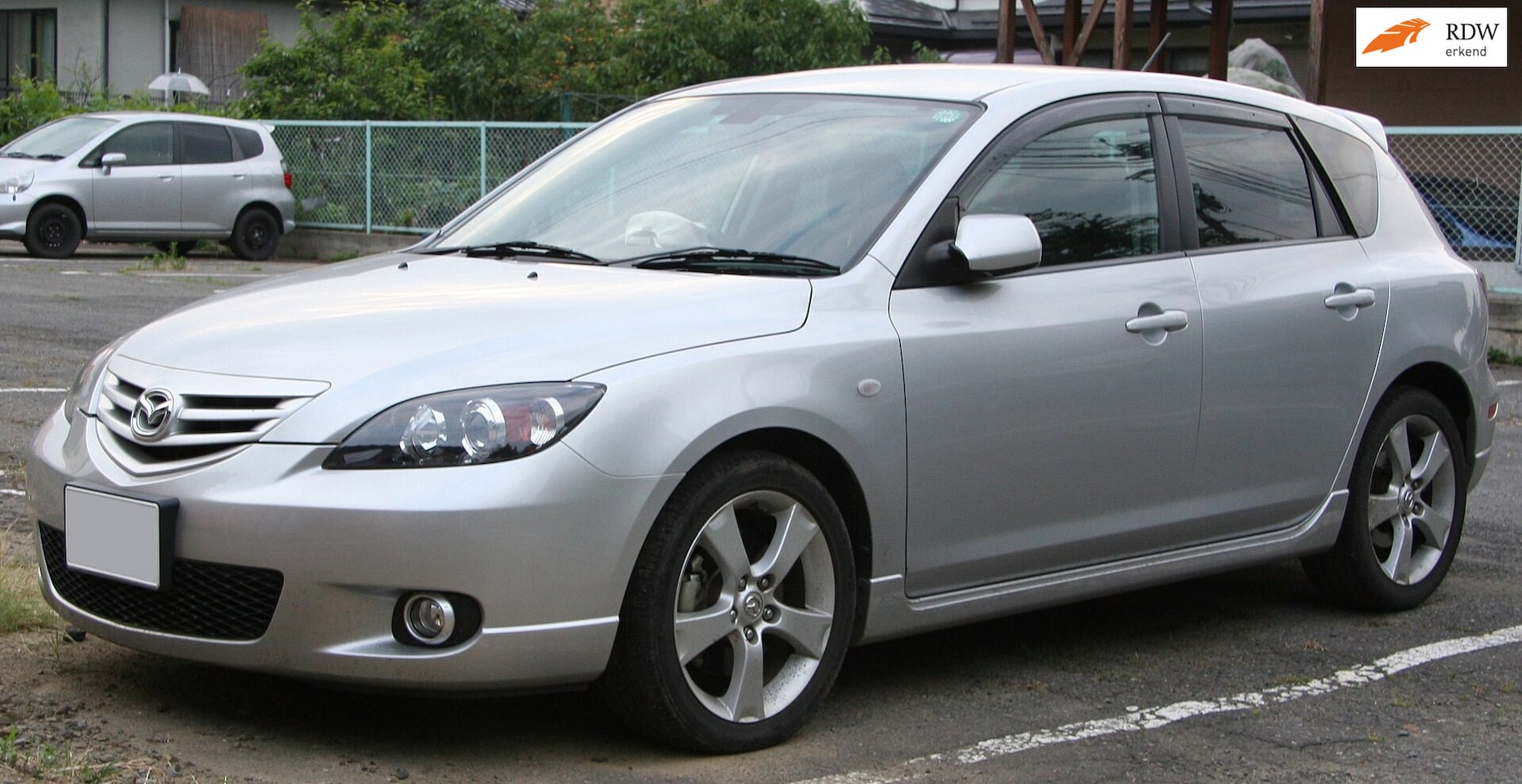 Mazda 3 Sport - €2250,- 1.4 Exclusive Apk 06/2027 5 Deurs Na pas - AutoWereld.nl
