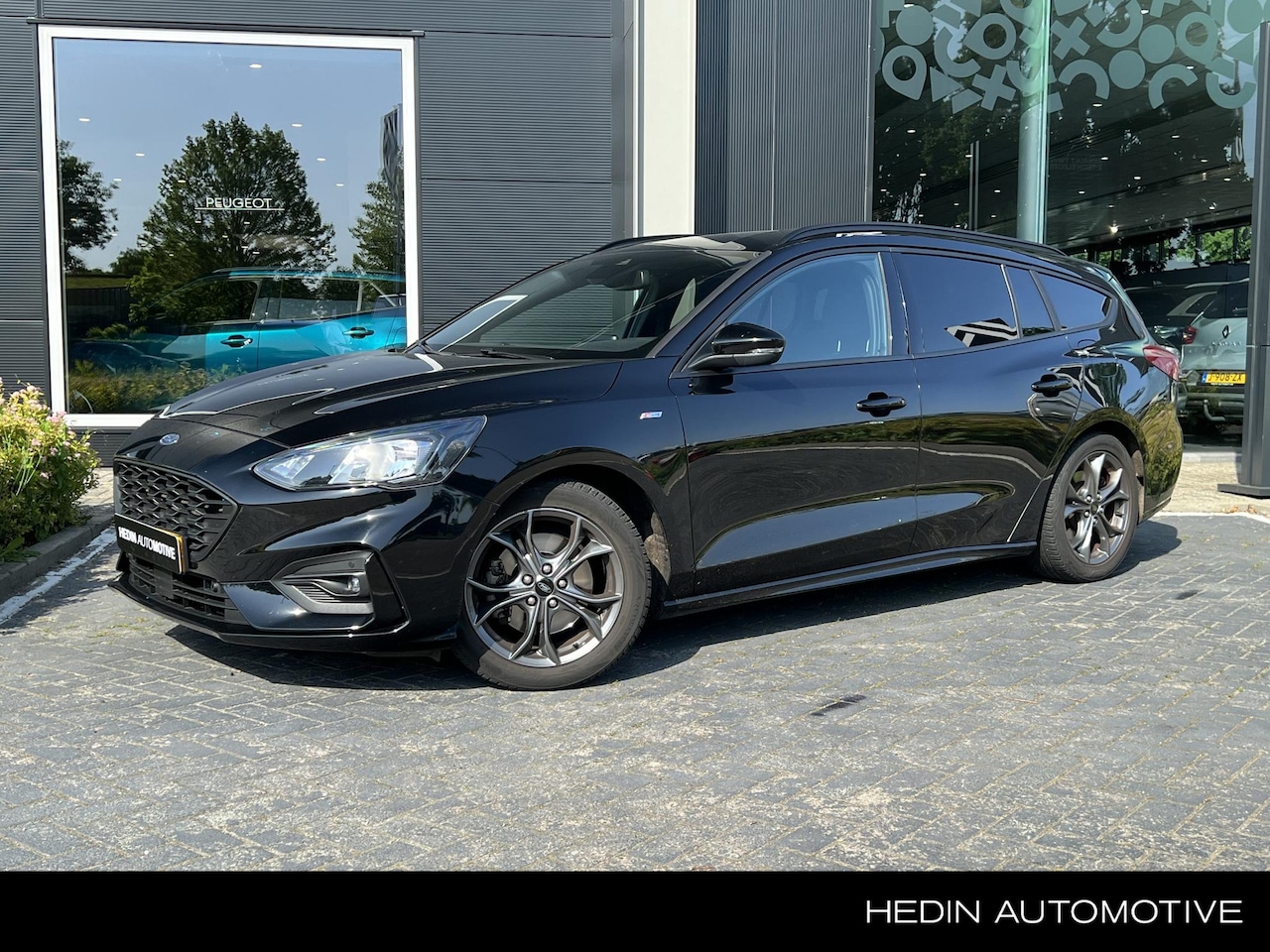 Ford Focus Wagon - 1.0 EcoBoost Titanium Business | Automaat | Cuirse | Keyless - AutoWereld.nl