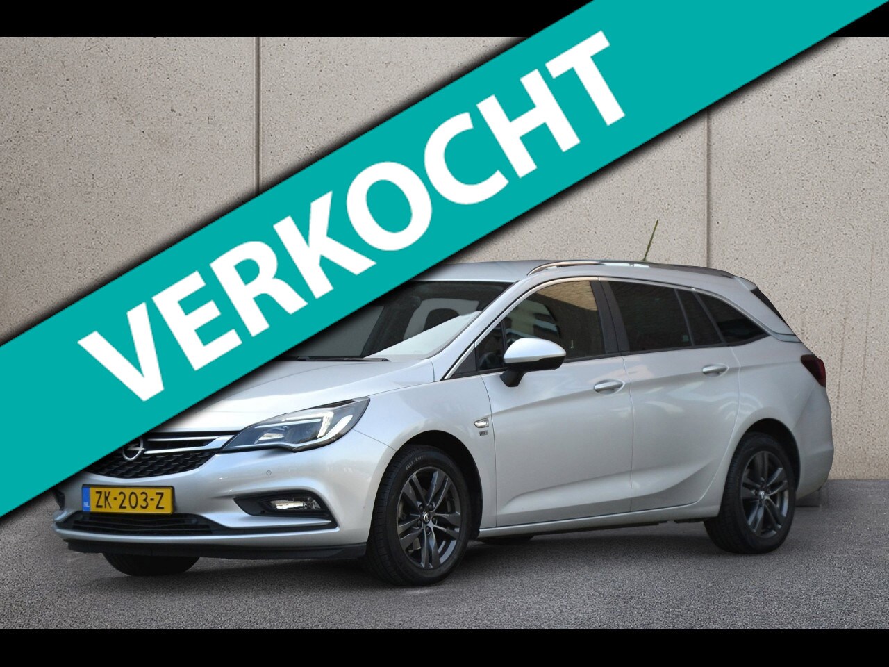 Opel Astra Sports Tourer - 1.0 Turbo 120 Jaar Edition | Navigatie | Climate Control | Parkeersensoren - AutoWereld.nl