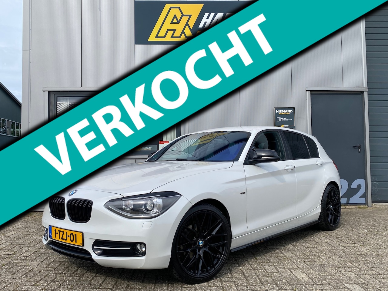 BMW 1-serie - 114i Sport | Nw. apk| NAP | Parelmoer - AutoWereld.nl