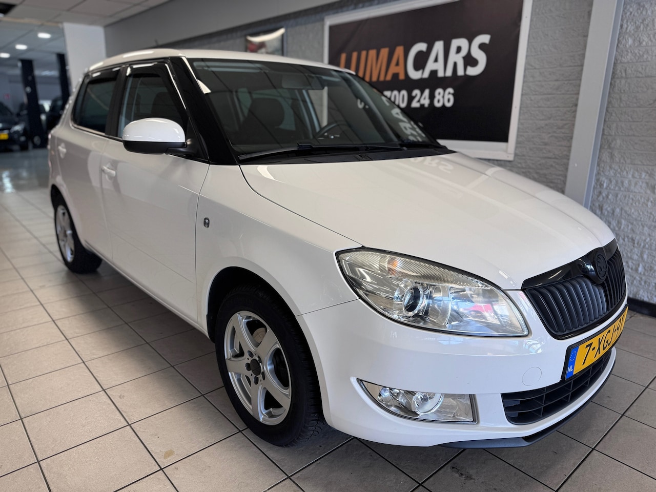 Skoda Fabia - 1.2 TSI Drive |Nieuwe APK |Cruise | Airco | Navi - AutoWereld.nl