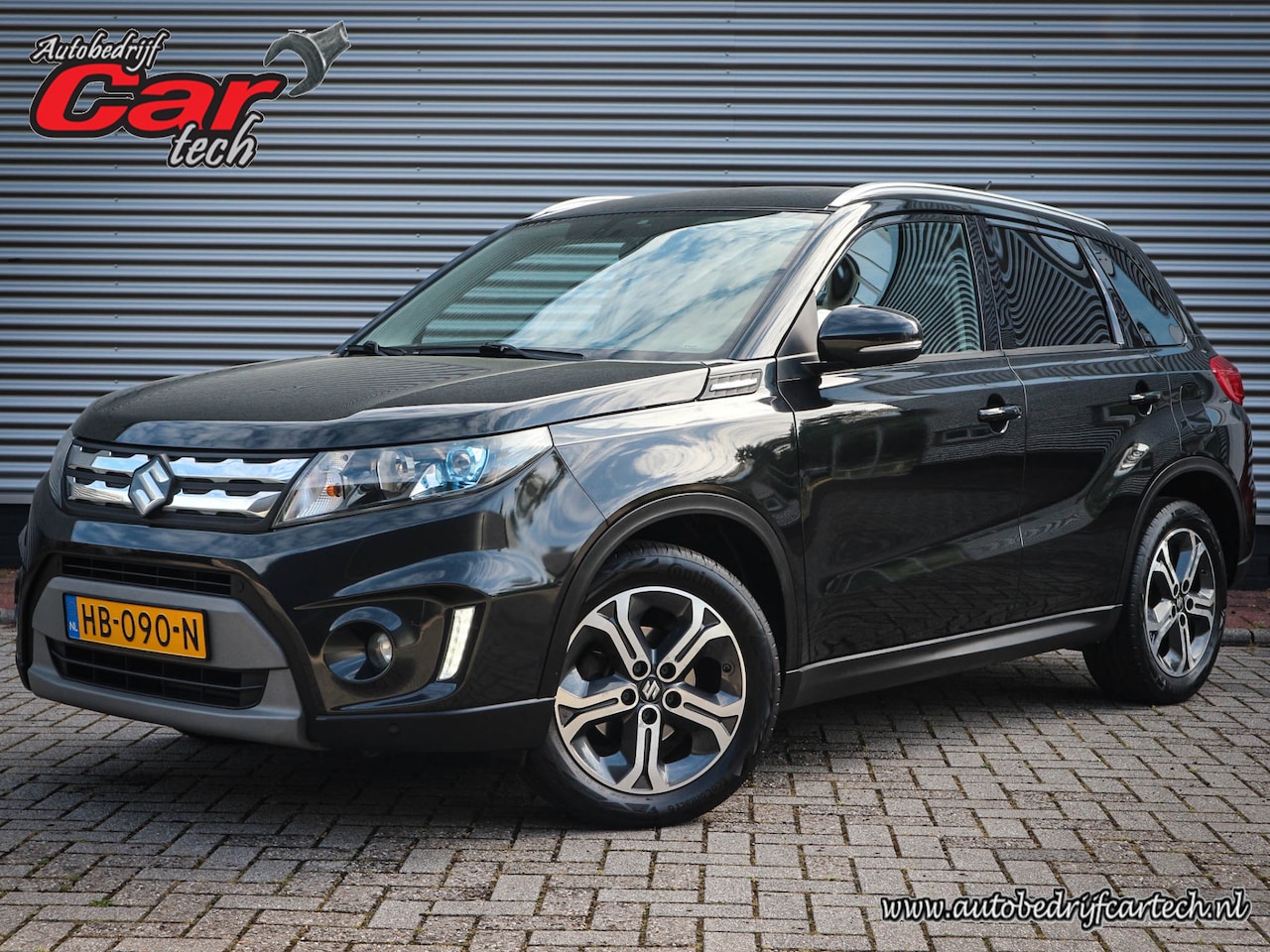 Suzuki Vitara - 1.6 High Executive Allgrip | Clima | Cruise | Navi | Half leer | Lichtmetaal | Camera | Pa - AutoWereld.nl