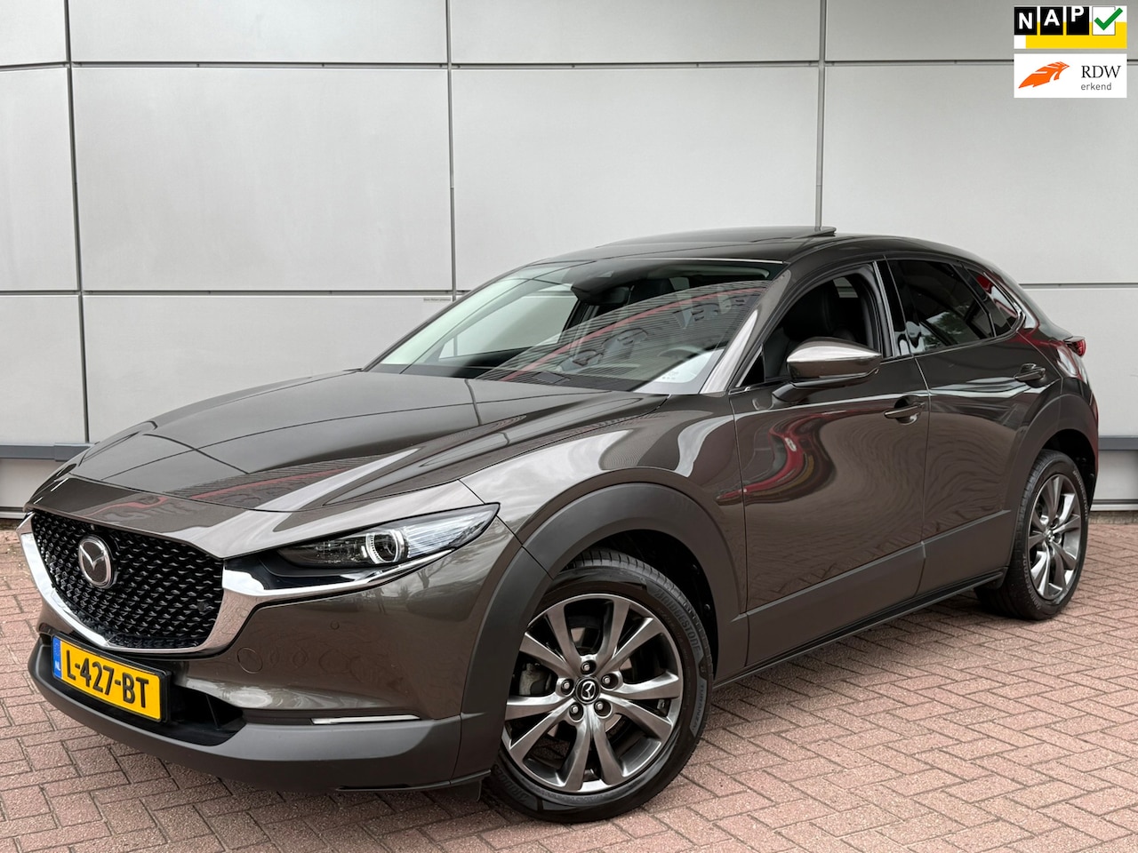 Mazda CX-30 - 2.0 e-SkyActiv-X M Hybrid Luxury |Schuif/Kanteldak|Trekhaak|360 Camera| - AutoWereld.nl