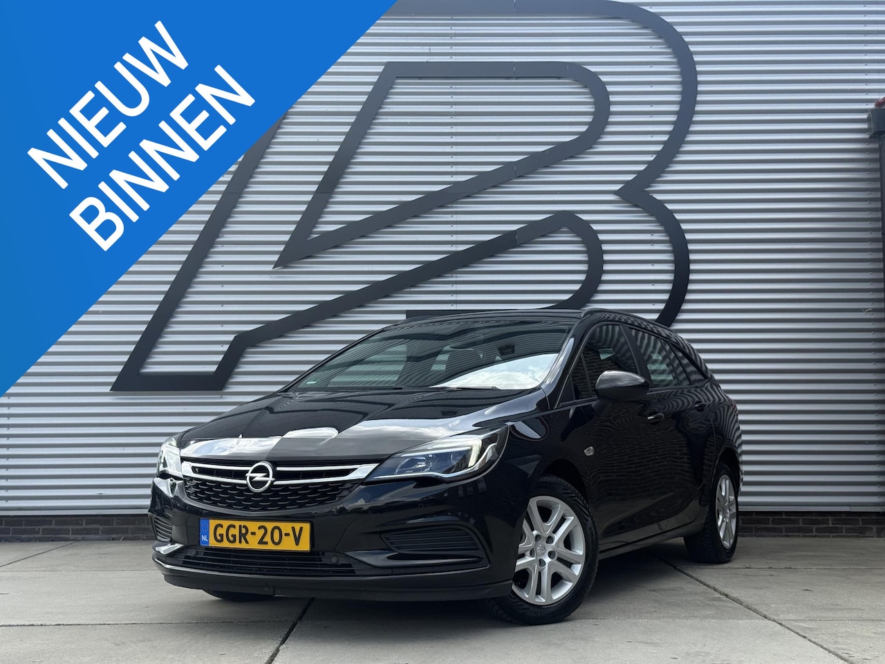 Opel Astra Sports Tourer - 1.0 Business Executive 1e Eigenaar|Navi|Trekhaak|Carplay|Clima|Cruise|PDC V+A|APK tot 09-2 - AutoWereld.nl