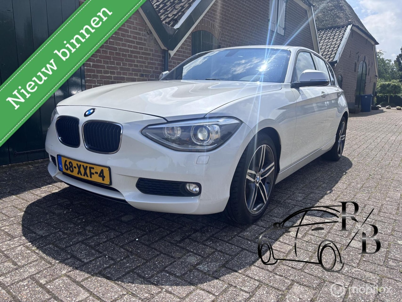 BMW 1-serie - 116i Upgrade Edition LEER NAVIGATIE - AutoWereld.nl
