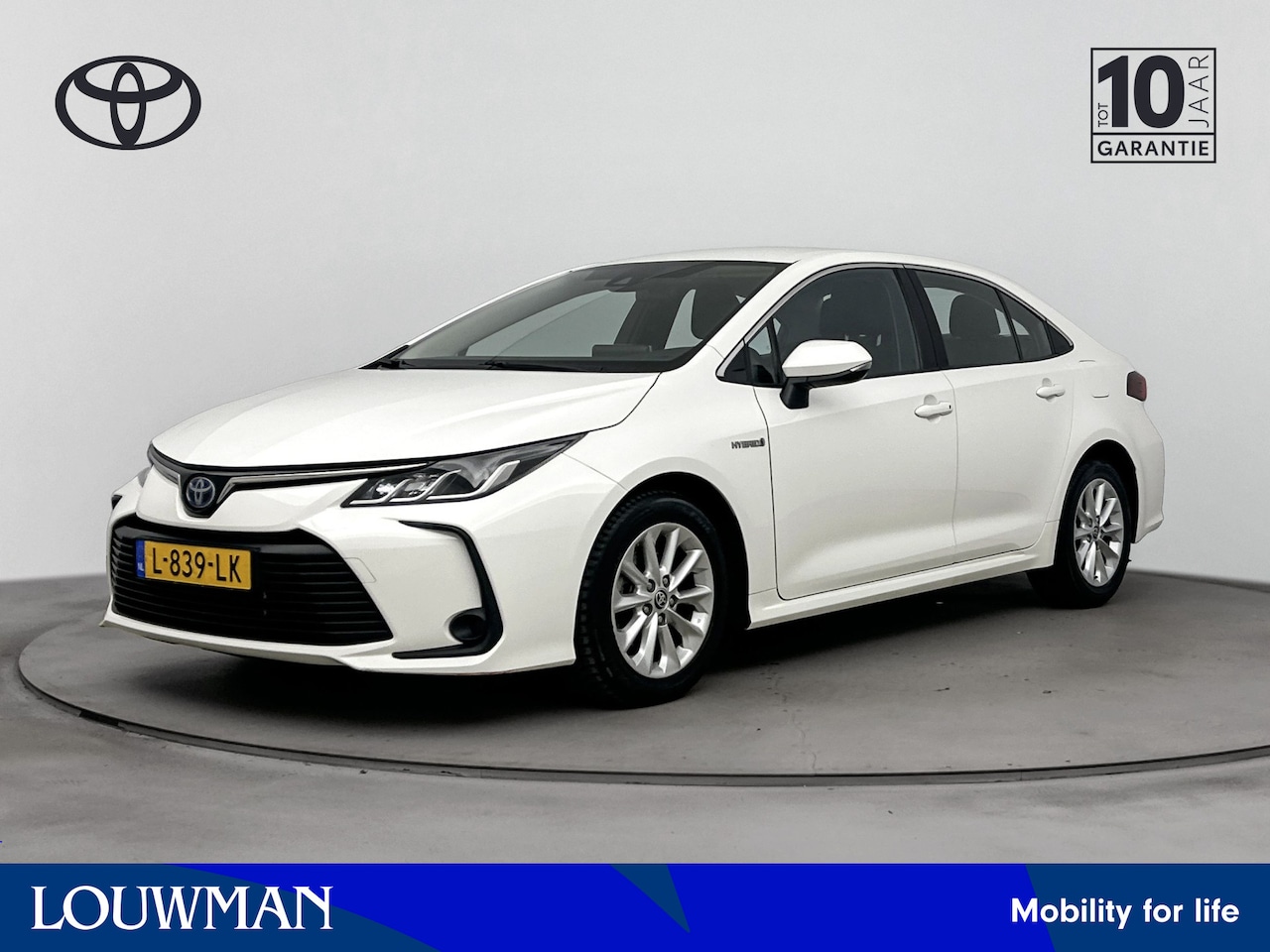 Toyota Corolla - Sedan 1.8 Hybrid Active | NL-Auto | Apple Carplay/Android Auto | Parkeercamera | t/m 15-06 - AutoWereld.nl