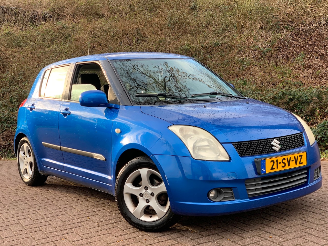 Suzuki Swift - 1.3 Shogun 5DEURS|Airco|MF.stuur|LMV|Nw.apk! - AutoWereld.nl