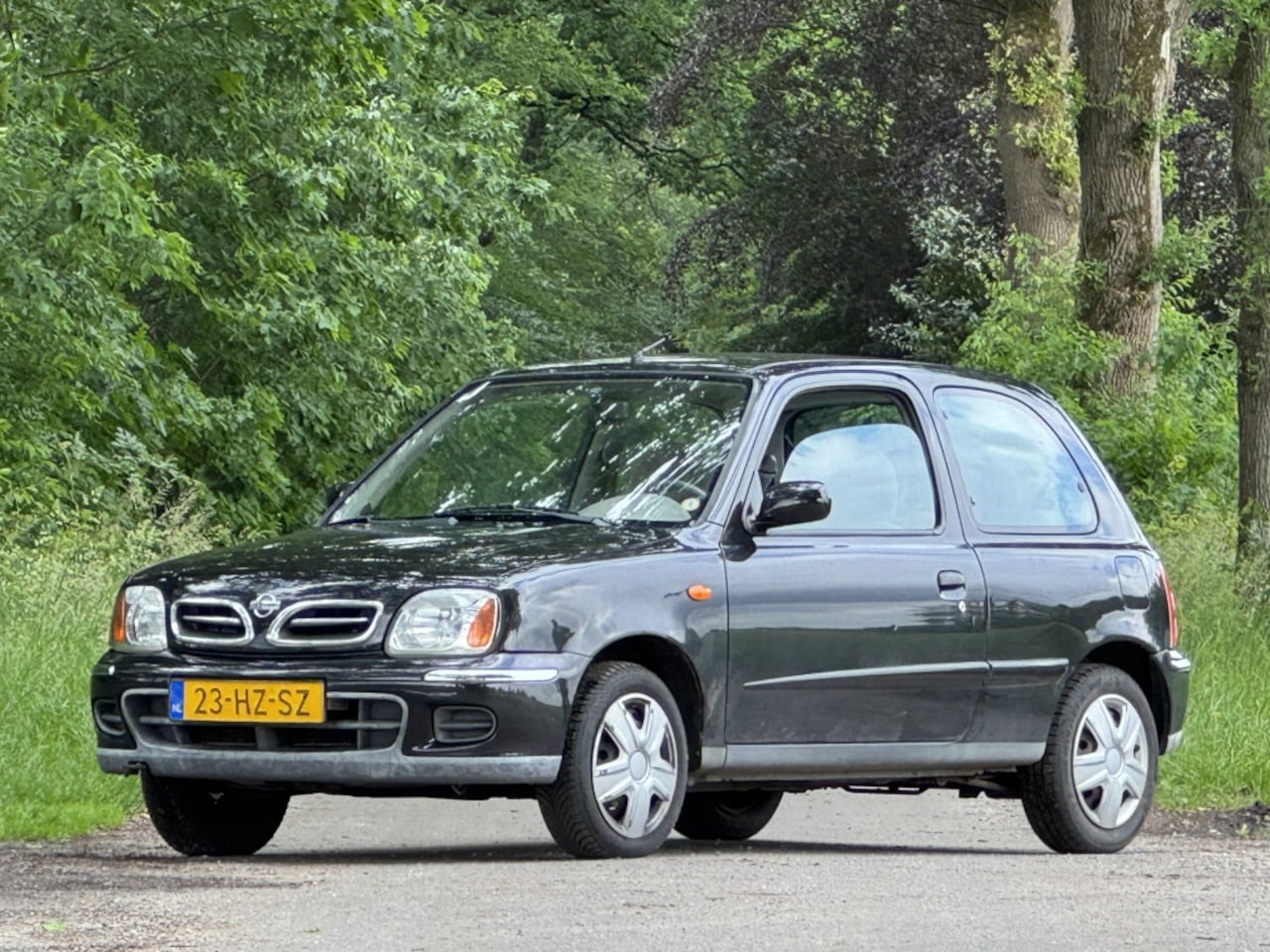 Nissan Micra - 1.4 Luxury CVT automaat apk 2-27 - AutoWereld.nl
