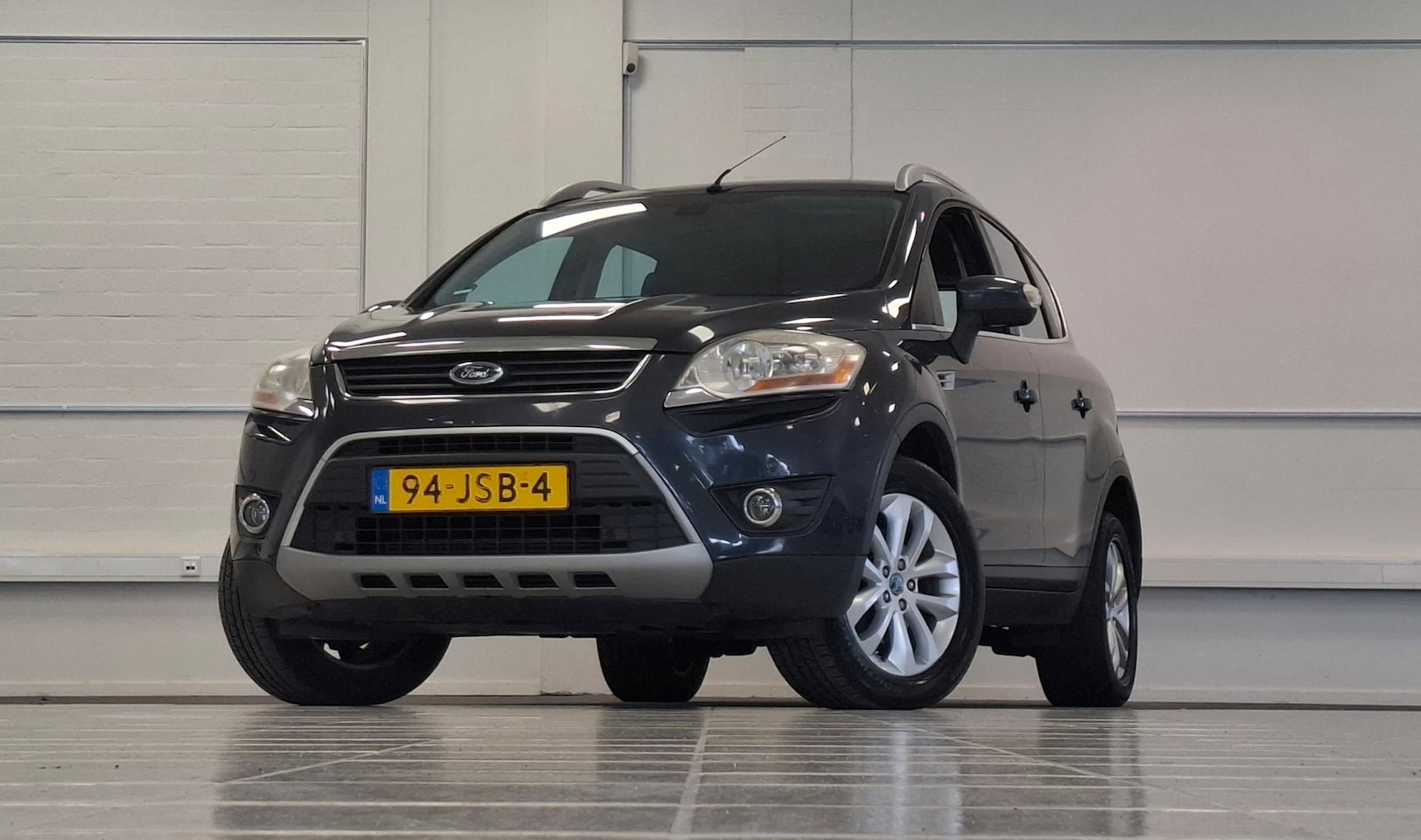 Ford Kuga - 2.5i 20V Titanium 2e Eigenaar Trekhaak Navi AWD Parkeerhulp Garantie - AutoWereld.nl