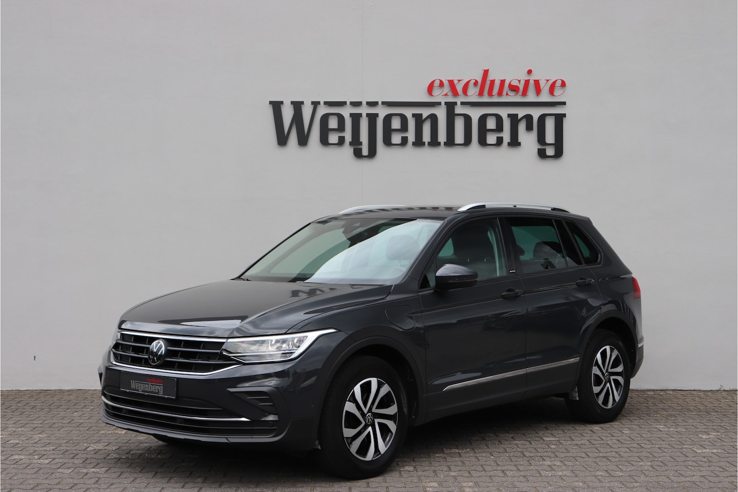 Volkswagen Tiguan - 1.4 TSI eHybrid ACC Carplay Navi PDC - AutoWereld.nl