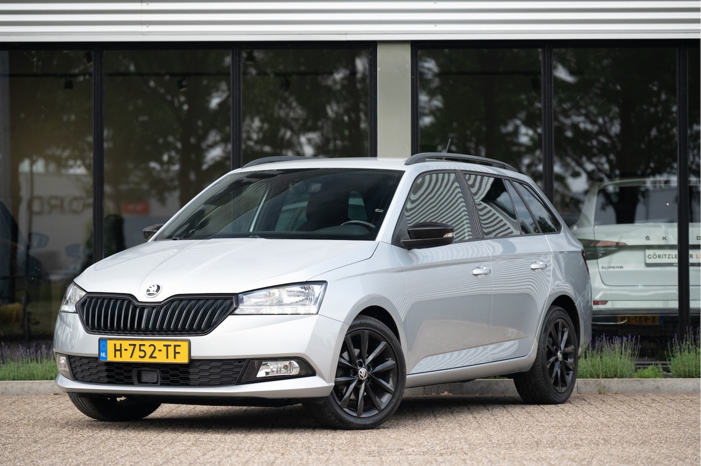 Skoda Fabia Combi - 1.0 TSI Sport Business | Navi | AppConnect | Cruise | Clima | 16" | PDC - AutoWereld.nl