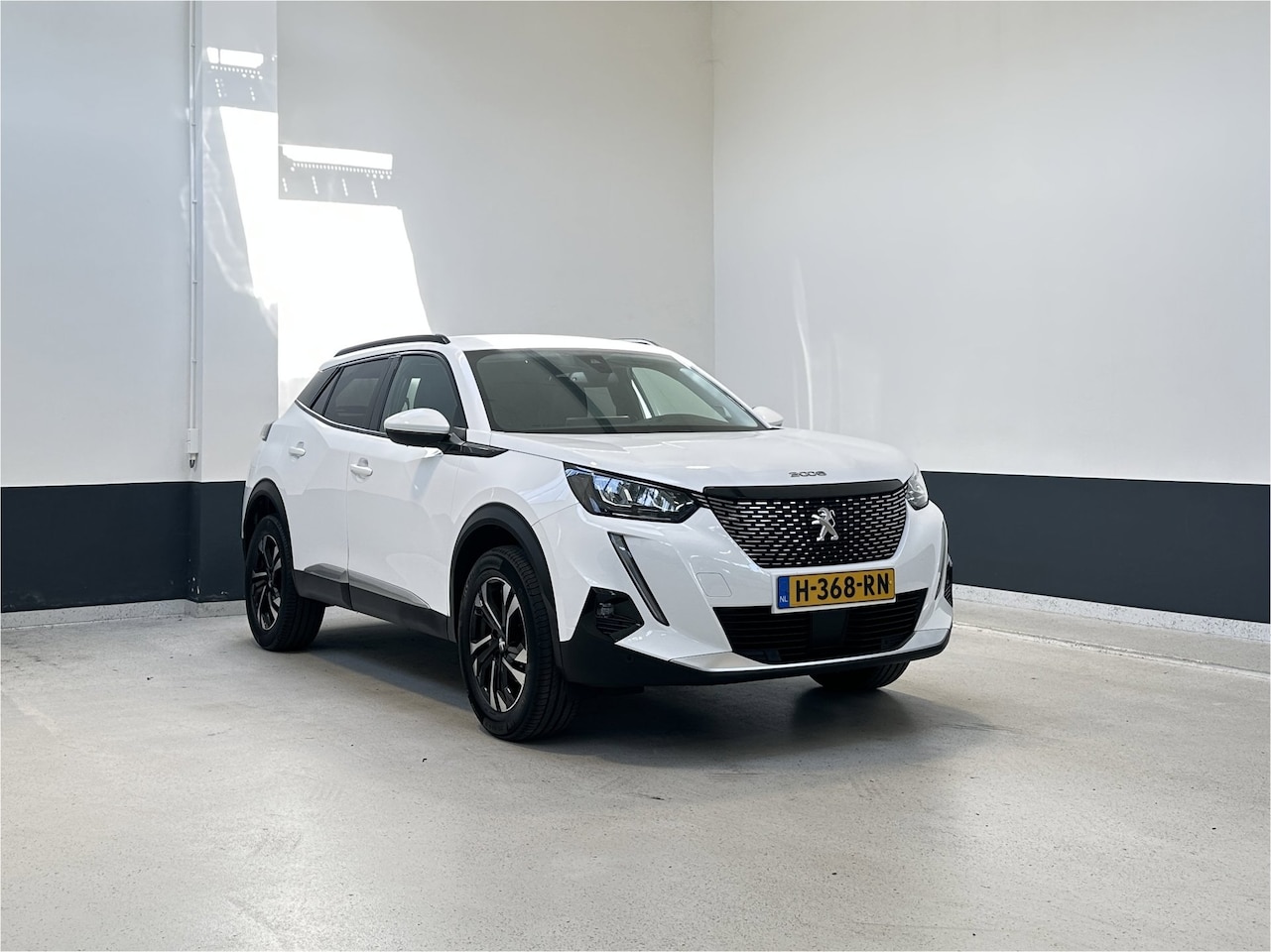 Peugeot 2008 - 1.2 PureTech Blue Lease Allure | Apple Carplay/Android Auto| Camera | - AutoWereld.nl