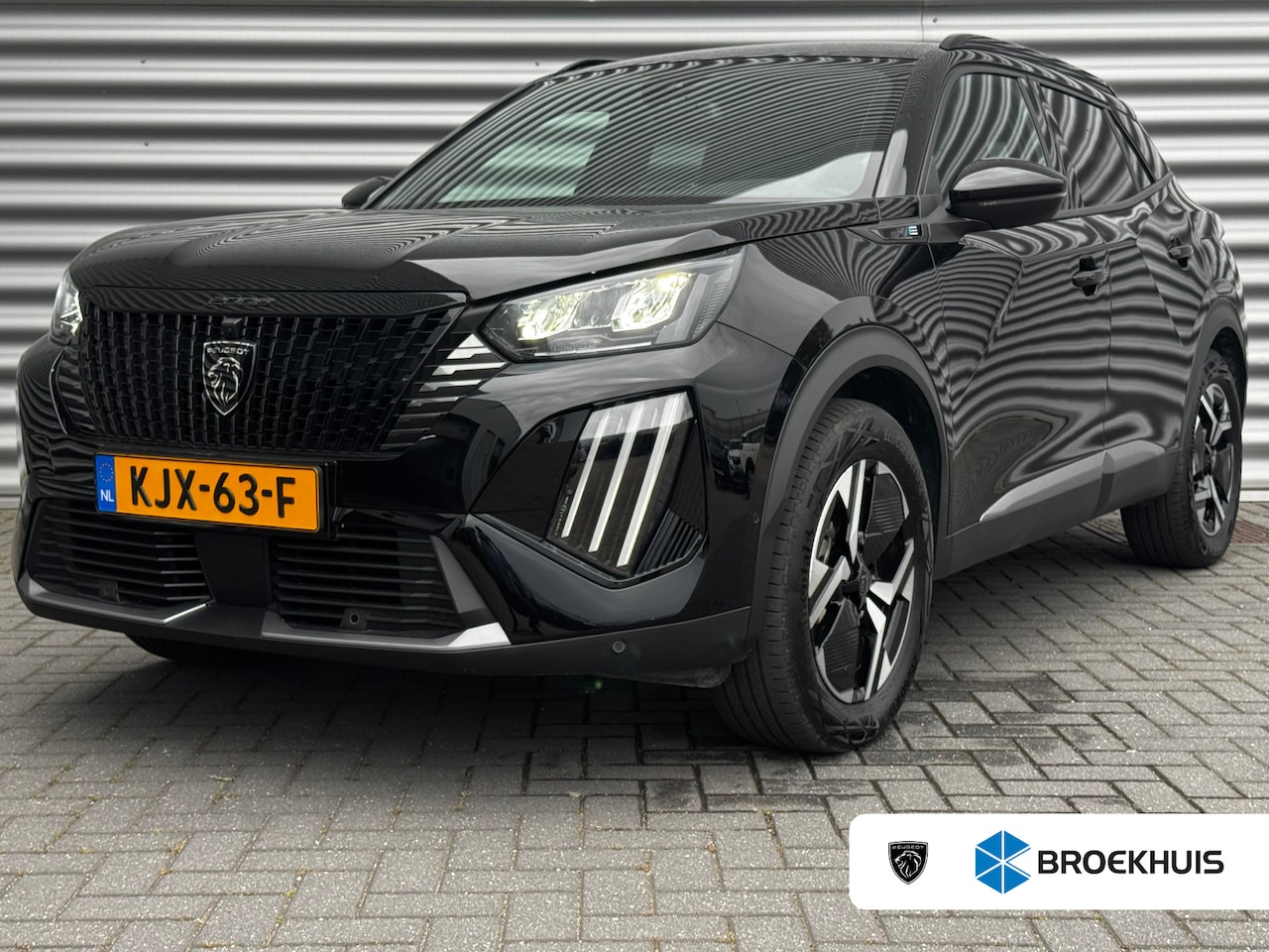 Peugeot e-2008 - 54KWH 156PK ALLURE AVANTAGE AUTOMAAT / NAVI / LEDER / CLIMA / LED / PDC / 17" LMV / KEYLES - AutoWereld.nl