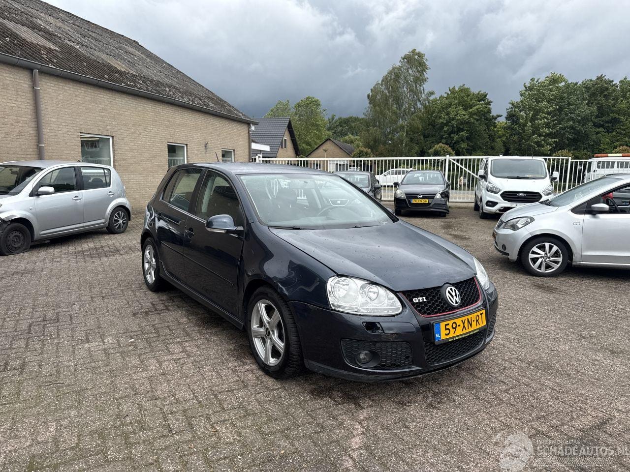 Volkswagen Golf - 1.6 FSI Optive 3 GTI LOOK - AutoWereld.nl