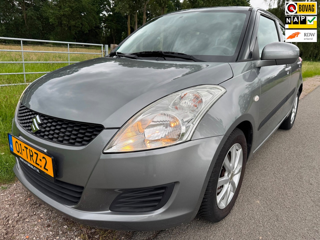 Suzuki Swift - 1.2 Comfort AUTOMAAT|stoelverwarming|airco - AutoWereld.nl