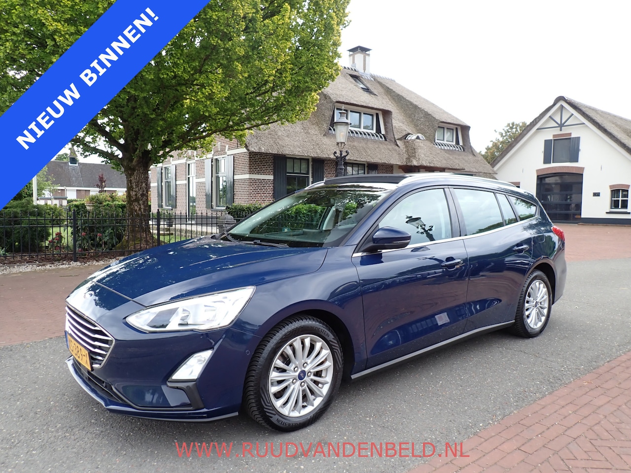 Ford Focus Wagon - 1.0 EcoBoost Titanium Business / CAMERA / PANO / TREKHAAK / KEYLESS / ACC - AutoWereld.nl
