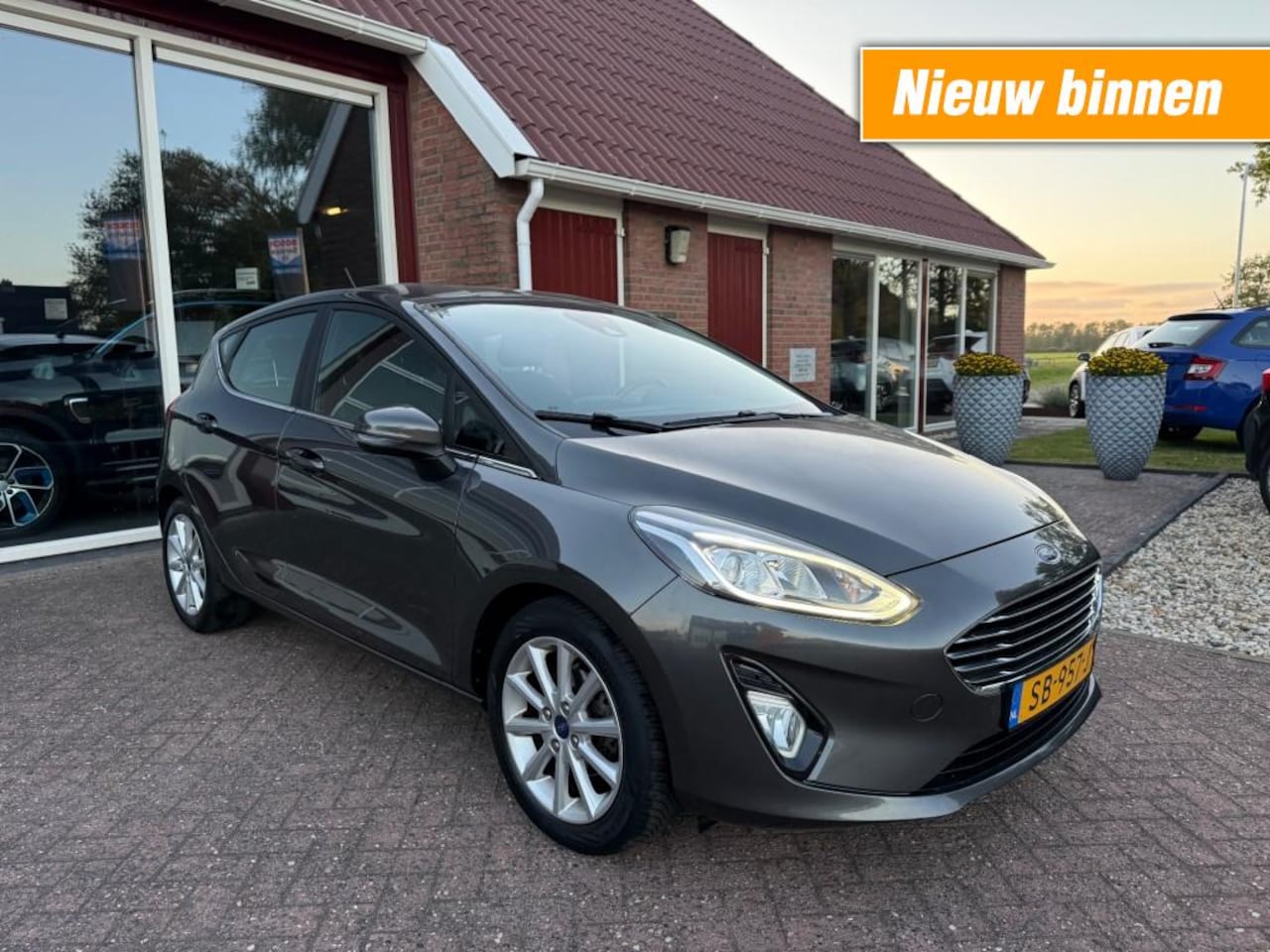 Ford Fiesta - 1.0 ECOB. TITANIUM Orig. NL/Navigatie/Cruise Control/Trekhaak - AutoWereld.nl