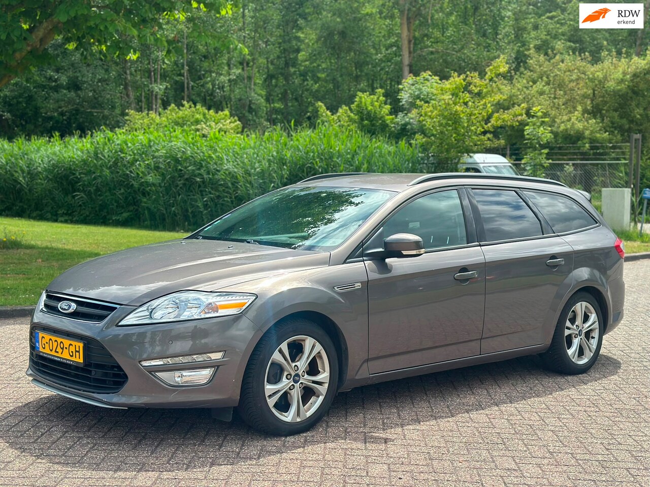 Ford Mondeo Wagon - 1.6 EcoBoost Lease Titanium/AIRCO/CRUISE/HALF LEDER/PARKEERSENS VOOR-ACHTER/VERWARMDE VOOR - AutoWereld.nl