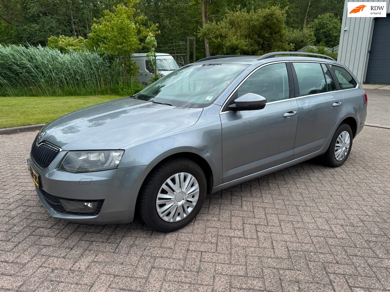 Skoda Octavia Combi - 1.4 TSI Greentech Ambition/CLIMA/CRUISE/HALFLEDER/PARKEERHULP/TREKHAAK/BLUETOOTH - AutoWereld.nl
