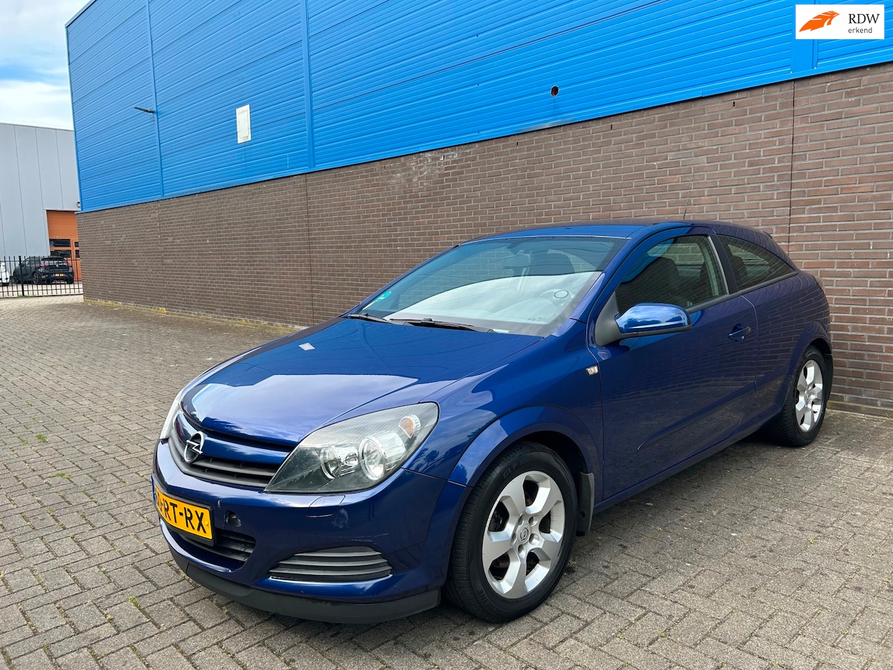 Opel Astra GTC - 1.6 Enjoy | Trekhaak | Camera | Navigatie | Cruise | Airco | 16” LM Velgen | El. Ramen & S - AutoWereld.nl