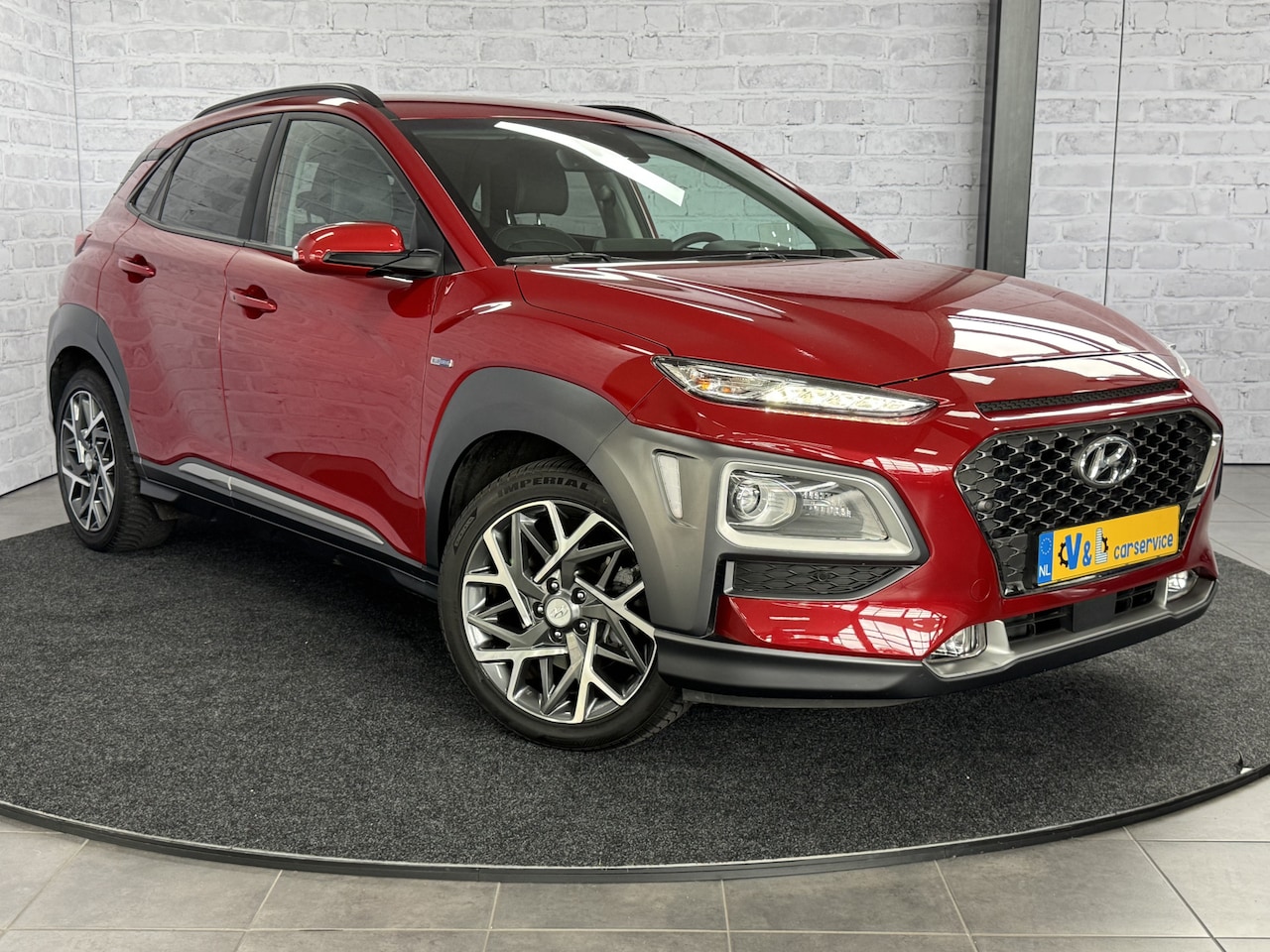 Hyundai Kona - 1.6 GDI HEV Premium HUD Keyless Trekhaak Leder - AutoWereld.nl