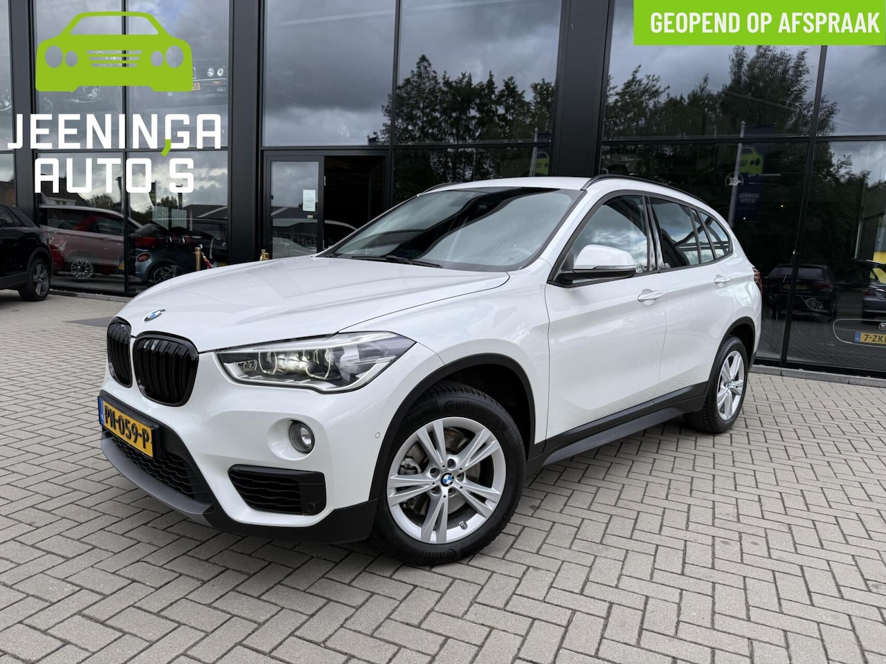 BMW X1 - sDrive20i High Executive|Stoelverwarming|afnTrekhaak|Clima|Navi|NAP - AutoWereld.nl