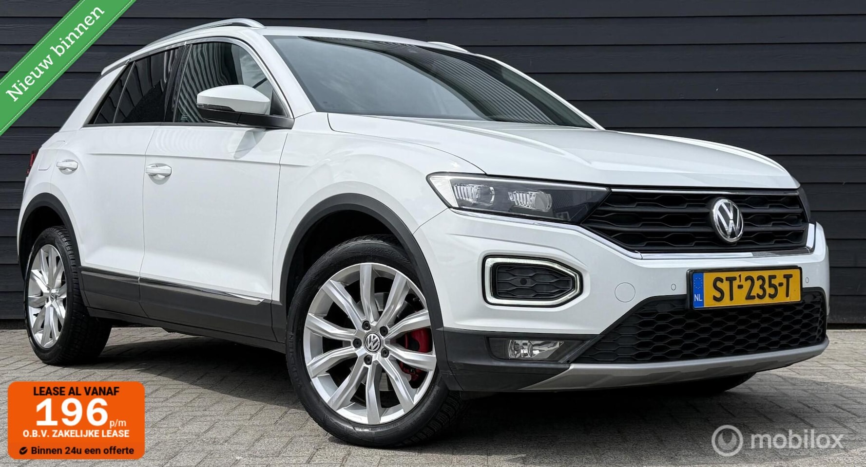 Volkswagen T-Roc - 1.5 TSI Sport Navi/LED/Clima/Cruise/PDC - AutoWereld.nl