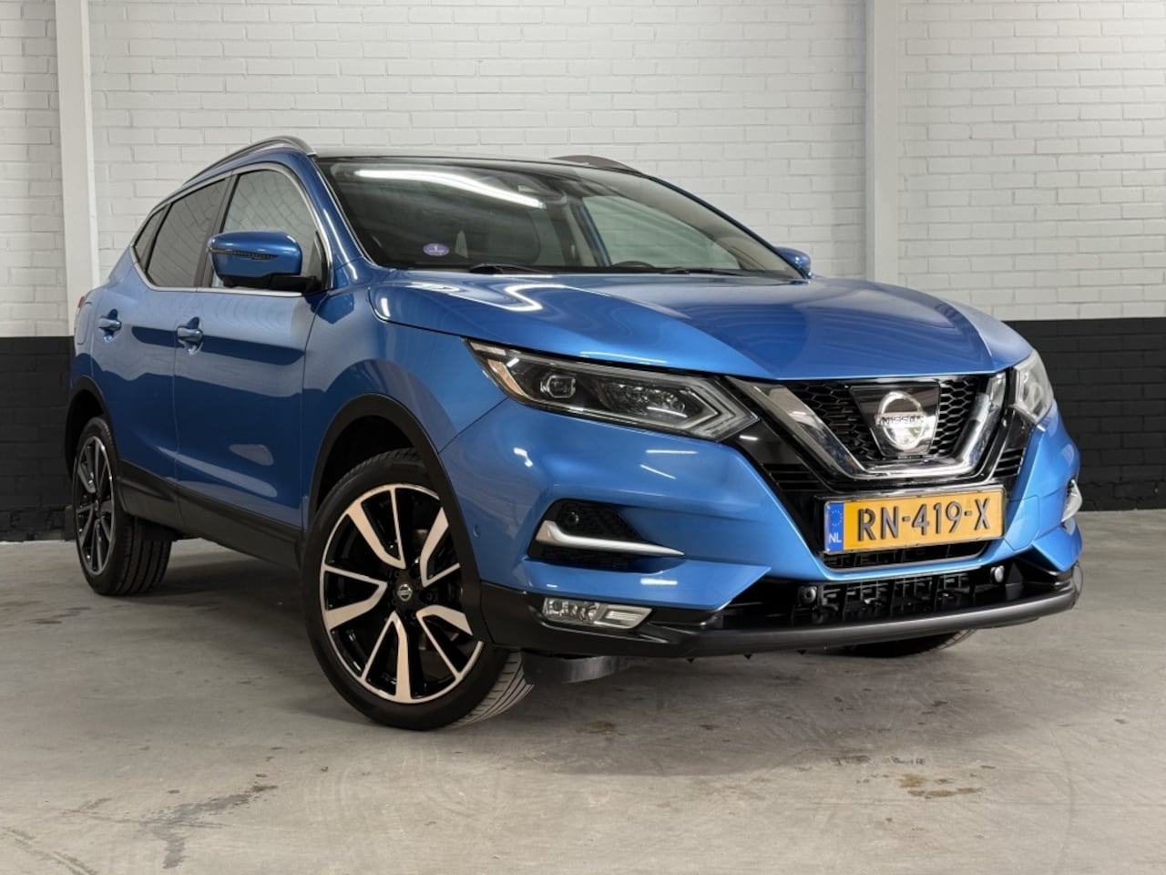 Nissan Qashqai - 1.6 Business Edition Panoramadak, Keyless, PDC, 360 Camera, Leer - AutoWereld.nl