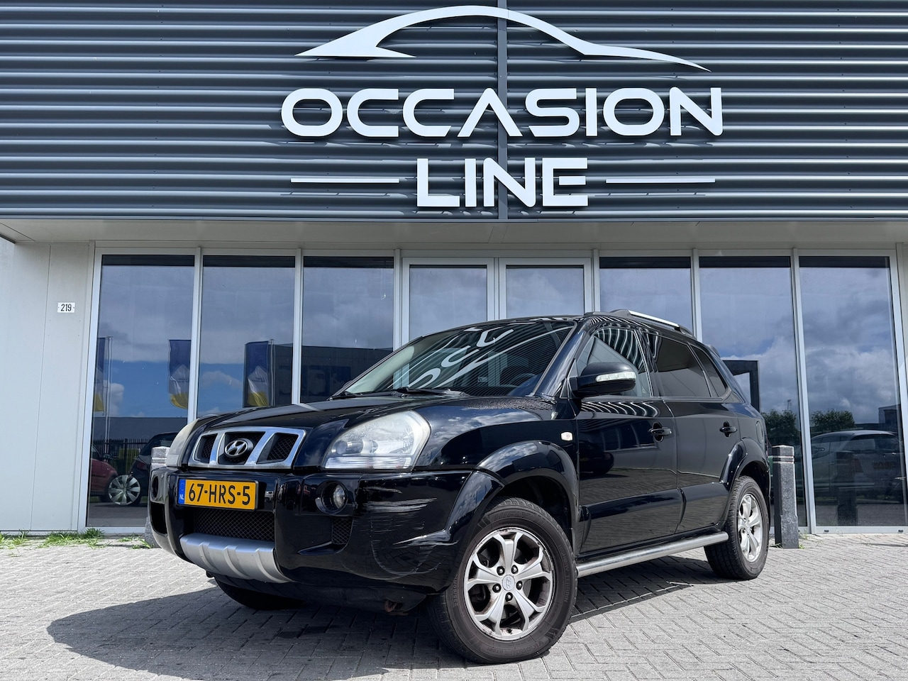 Hyundai Tucson - 2.0i Style Executive | Trekhaak | NAP | Parkeersensor | Airco - AutoWereld.nl