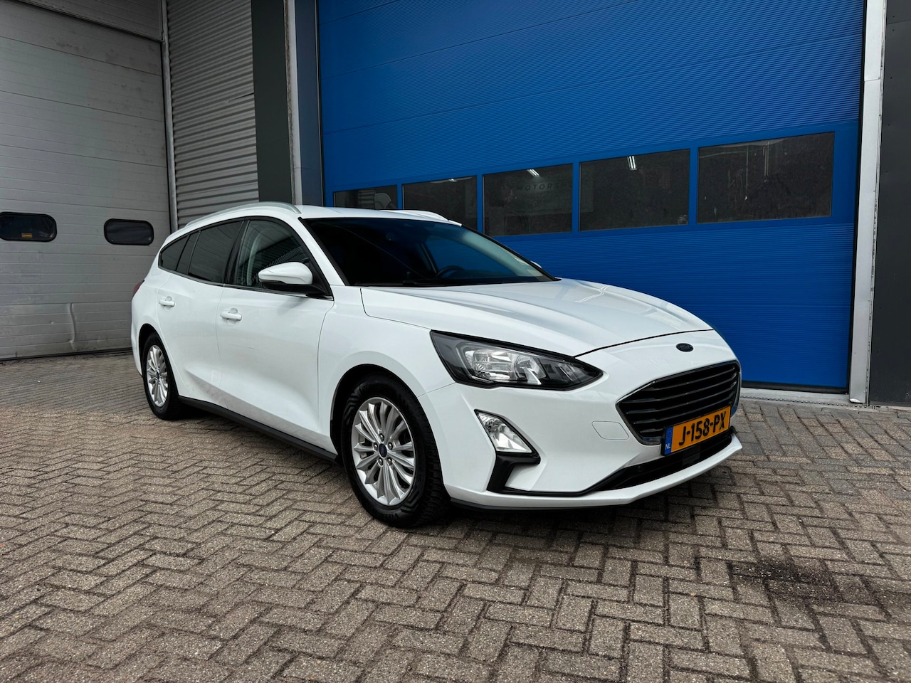 Ford Focus Wagon - 1.0 EcoBoost Hybrid Titanium X Business 1.0 EcoBoost Hybrid Titanium X Business - AutoWereld.nl