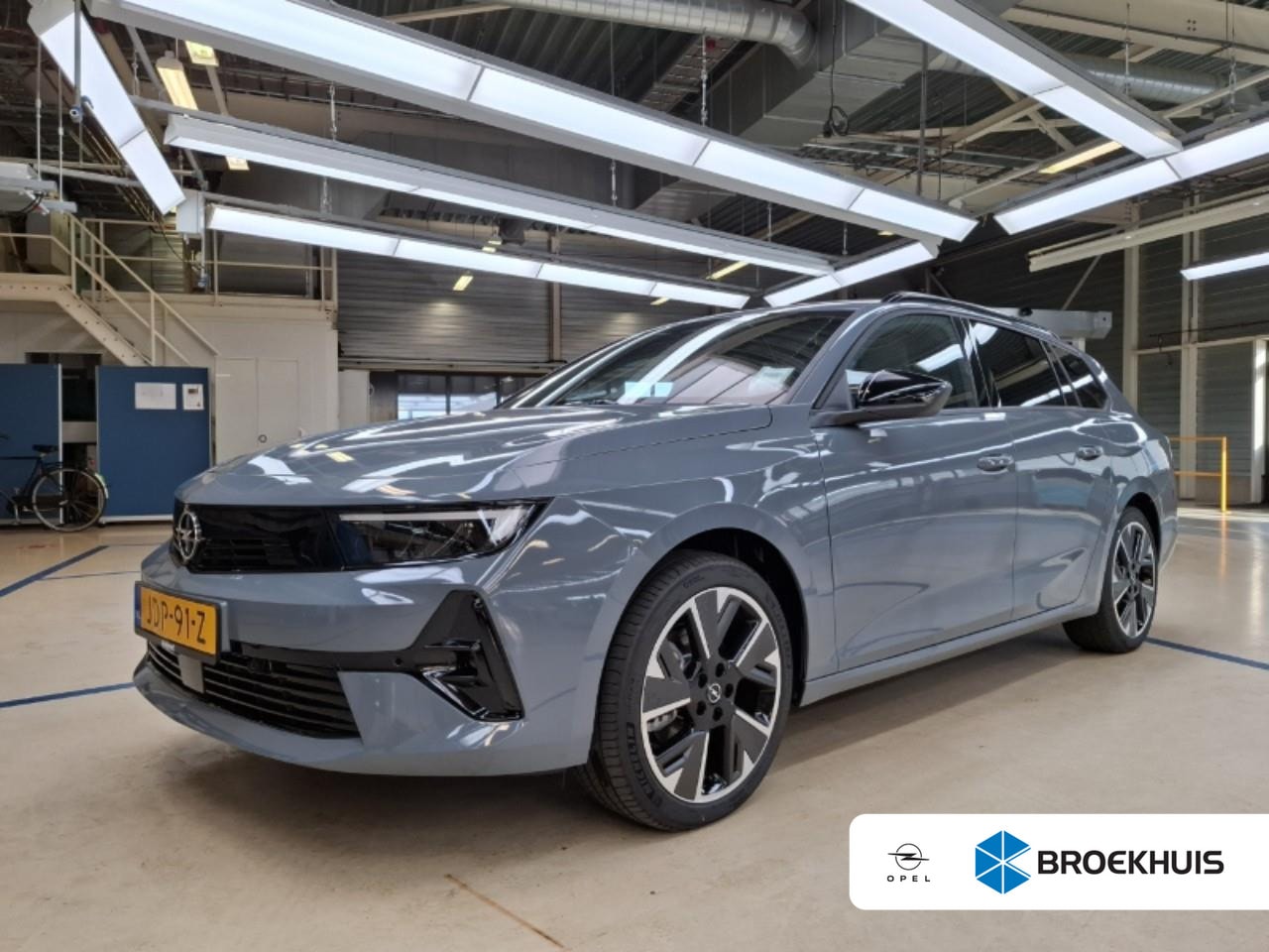 Opel Astra Electric - 54 kWh Business Edition / Navigatie / Camera / Warmtepomp / Stuur -en stoelverwarmd / Park - AutoWereld.nl
