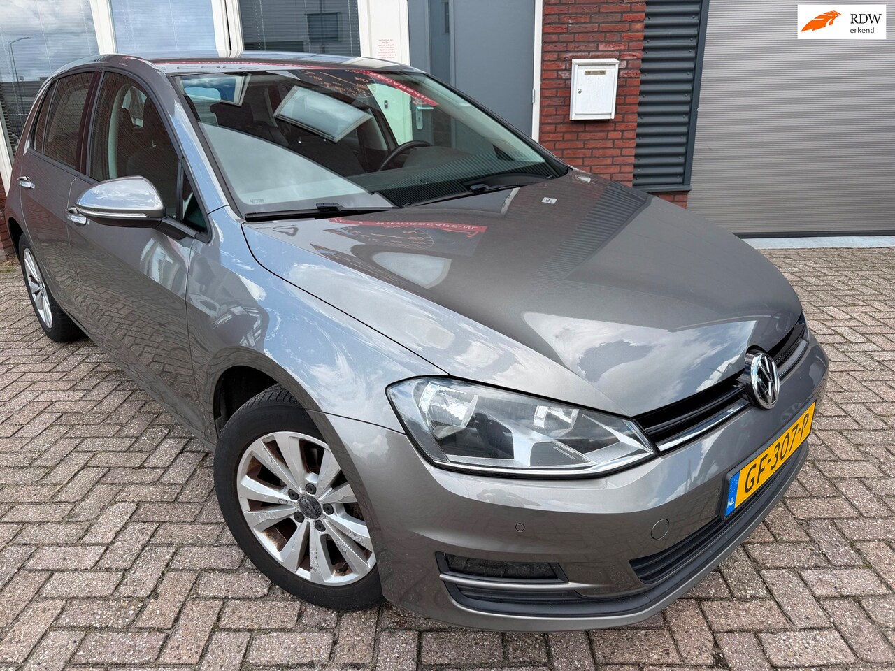 Volkswagen Golf - 1.2 TSI Comfortline / Navi / PDC / Cruise / Clima / LM - AutoWereld.nl